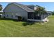 This home offers a screened patio and well-maintained landscaping at 13940 Corrine Key Pl, Orlando, FL 32824