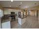 Modern kitchen with stainless steel appliances, granite countertops, and ample cabinet space at 13940 Corrine Key Pl, Orlando, FL 32824
