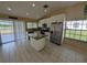 Well-equipped kitchen with granite countertops, stainless appliances, and a convenient center island at 13940 Corrine Key Pl, Orlando, FL 32824