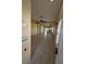 Bright and open-concept living space with tile flooring that flows seamlessly into the kitchen at 13940 Corrine Key Pl, Orlando, FL 32824