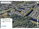 Aerial view of a residential area with houses, trees, and lakes at 1425 Carey Glen Cir, Orlando, FL 32824