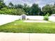 Large grassy backyard with a storage shed and white privacy fence at 1425 Carey Glen Cir, Orlando, FL 32824