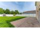 Large backyard with a storage shed and white vinyl fence at 1425 Carey Glen Cir, Orlando, FL 32824