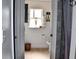 Bright bathroom with shower, toilet, decor, and wood-look floors at 1425 Carey Glen Cir, Orlando, FL 32824