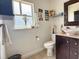 Bright bathroom featuring commode, vanity and decor at 1425 Carey Glen Cir, Orlando, FL 32824