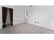 Spacious bedroom with grey carpet, featuring a walk-in closet at 1425 Carey Glen Cir, Orlando, FL 32824