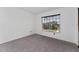Bright and airy bedroom, featuring large window with blinds at 1425 Carey Glen Cir, Orlando, FL 32824