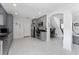 Modern kitchen with gray cabinets, stainless steel appliances, and tile flooring at 1425 Carey Glen Cir, Orlando, FL 32824