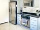 Well-equipped kitchen featuring stainless steel appliances and modern finishes at 1425 Carey Glen Cir, Orlando, FL 32824