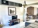 Bright living room featuring modern decor, stylish furnishings, and tiled floors at 1425 Carey Glen Cir, Orlando, FL 32824