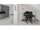 Cozy office area with desk, rocking chair, and kitchen access at 1425 Carey Glen Cir, Orlando, FL 32824