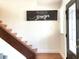 Staircase landing, featuring natural light and modern decor at 1425 Carey Glen Cir, Orlando, FL 32824