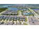 Aerial view of the property with neighborhood, community amenities and lake views at 14309 Lanikai Beach Dr, Orlando, FL 32827