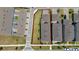 Aerial view of the property shows the backyard, street view, and surrounding homes at 14309 Lanikai Beach Dr, Orlando, FL 32827