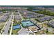 Aerial view of the neighborhood with pool and clubhouse in view at 14309 Lanikai Beach Dr, Orlando, FL 32827