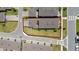 Aerial view of the property shows the backyard and relationship to adjacent street at 14309 Lanikai Beach Dr, Orlando, FL 32827