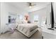 Bedroom with carpet floors, a ceiling fan, a TV, and an exercise bike at 14309 Lanikai Beach Dr, Orlando, FL 32827