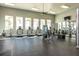 The community gym features a variety of modern exercise equipment and ample space at 14309 Lanikai Beach Dr, Orlando, FL 32827