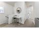 Hallway features a desk and chair on the left and an open door on the right at 14309 Lanikai Beach Dr, Orlando, FL 32827