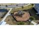 Aerial view of a community playground with climbing structures and slides for children at 14309 Lanikai Beach Dr, Orlando, FL 32827