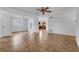 Bright living room featuring tile floors, neutral walls, ceiling fans, and an open floor plan concept at 1436 Nolton Way, Orlando, FL 32822