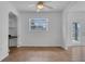 Living room with tile flooring, neutral paint, a ceiling fan, and a view of the outdoor area at 1436 Nolton Way, Orlando, FL 32822