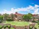 Breathtaking aerial perspective of a custom home, showcasing its unique architecture and beautifully landscaped yard at 15121 Pendio Dr, Montverde, FL 34756