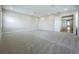 Spacious bonus room featuring plush carpeting and an open doorway to the rest of the home at 15121 Pendio Dr, Montverde, FL 34756
