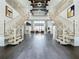 Grand foyer features soaring ceilings, a double staircase, and an open floor plan with views to the living area at 15121 Pendio Dr, Montverde, FL 34756
