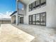 Spacious patio with tile flooring offering seamless transition to indoor living, perfect for entertaining or relaxing at 15121 Pendio Dr, Montverde, FL 34756