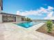 Enjoy the stunning outdoor living with an infinity pool, open-air kitchen, and breathtaking lake views at 15121 Pendio Dr, Montverde, FL 34756