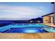 An amazing outdoor swimming pool overlooks a panoramic ocean view, offering a luxurious place to swim and relax at 15121 Pendio Dr, Montverde, FL 34756