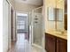 This bathroom offers a convenient walk-in shower and vanity at 15341 Groose Point Ln, Clermont, FL 34714