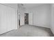 Bedroom showing a closet and access to the bathroom at 16614 Lazy Breeze Loop, Clermont, FL 34714