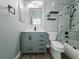 Modern bathroom featuring a vanity with sink, a toilet, and a glass-enclosed shower at 2312 Twickingham Ct, Clermont, FL 34711