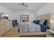 Light and airy bedroom with king size bed and slider doors to the outdoor lanai at 252 Barbera Dr, Davenport, FL 33897