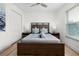 Bedroom featuring a large window for natural light and a modern ceiling fan at 252 Barbera Dr, Davenport, FL 33897