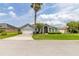 Charming single-story home featuring a two-car garage, manicured lawn, and beautiful landscaping at 252 Barbera Dr, Davenport, FL 33897