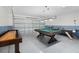 Spacious game room featuring a shuffleboard table, pool table, and air hockey table at 252 Barbera Dr, Davenport, FL 33897