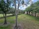Exterior view of lawn and community buildings at 2572 Robert Trent Jones Dr # 1227, Orlando, FL 32835