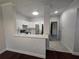 Modern kitchen with white cabinets, stainless steel appliances, and a stylish backsplash at 2572 Robert Trent Jones Dr # 1227, Orlando, FL 32835