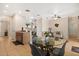 Breakfast nook with a glass table and seating, situated near the kitchen area at 2616 Marg Ln, Kissimmee, FL 34758