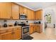 Kitchen boasts stainless steel appliances, plenty of cabinets, and a decorative backsplash at 2616 Marg Ln, Kissimmee, FL 34758