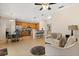 Spacious living area with open layout, adjacent to the kitchen and dining areas at 2616 Marg Ln, Kissimmee, FL 34758