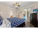 Relaxing main bedroom with access to a private patio or balcony at 2616 Marg Ln, Kissimmee, FL 34758