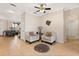 Bright sitting room with neutral decor, tile flooring, and comfortable seating at 2616 Marg Ln, Kissimmee, FL 34758