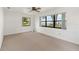 Spacious bedroom with large windows offering serene views at 2740 Barker Rd, St Cloud, FL 34771