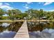 Dock leading to homes along lake at 2740 Barker Rd, St Cloud, FL 34771