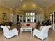 Bright and welcoming lobby area featuring comfortable seating, elegant decor, and ample natural light at 4008 San Gallo Dr # 106, Kissimmee, FL 34741
