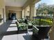 Relaxing outdoor seating area featuring cushioned chairs, offering a comfortable space to unwind at 4008 San Gallo Dr # 106, Kissimmee, FL 34741